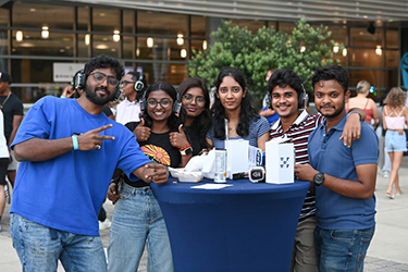 Group of male and female UNF students attending an event at the Student Union