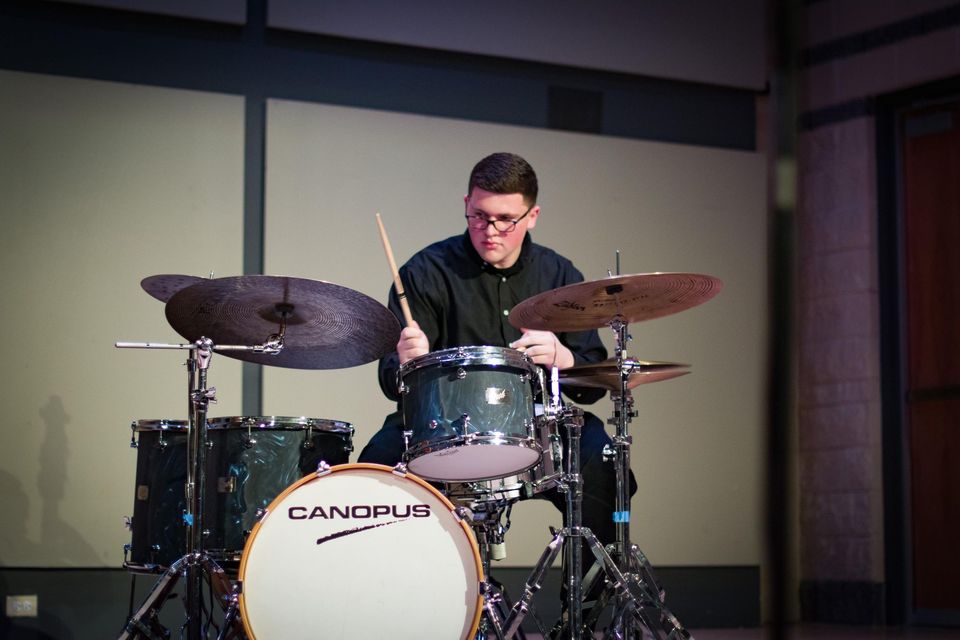 Drummer performing on stage
