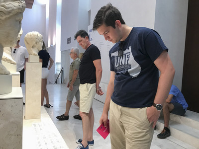 UNF student looking at museum sculptures during study abroad trip