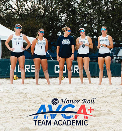 UNF beach volleyball players standing in the sand Honor Roll AVCA+ Team Academic logo