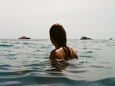 Woman swimming at the beach