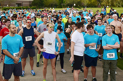 UNF Swoop the Loop 5K Run participants gathering before the event