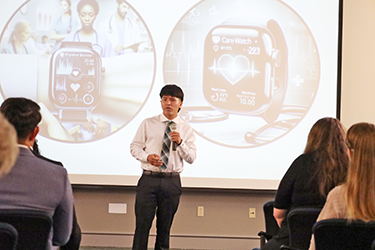UNF student speaking in front of an audience