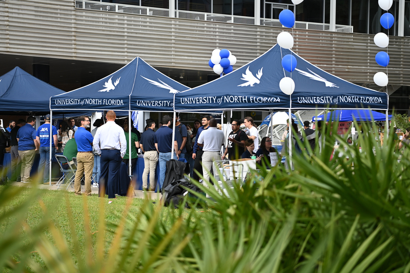 University of North Florida event tents with balloons in Osprey Plaza