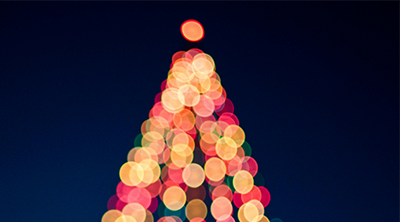 Christmas tree with lights at night