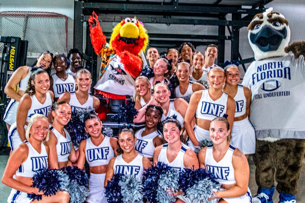 UNF cheerleaders with Ozzie mascot and Jax Sharks mascot