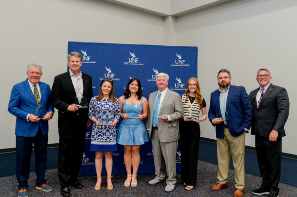 Taylor Leadership Award recipients posing with their awards
