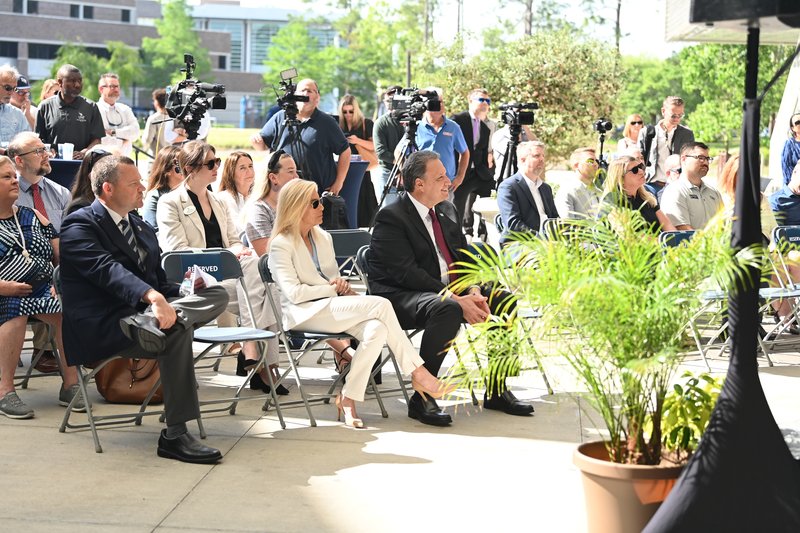 Jackonville Mayor and UNF President seated at an event