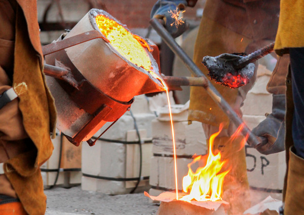 iron being poured into a mold