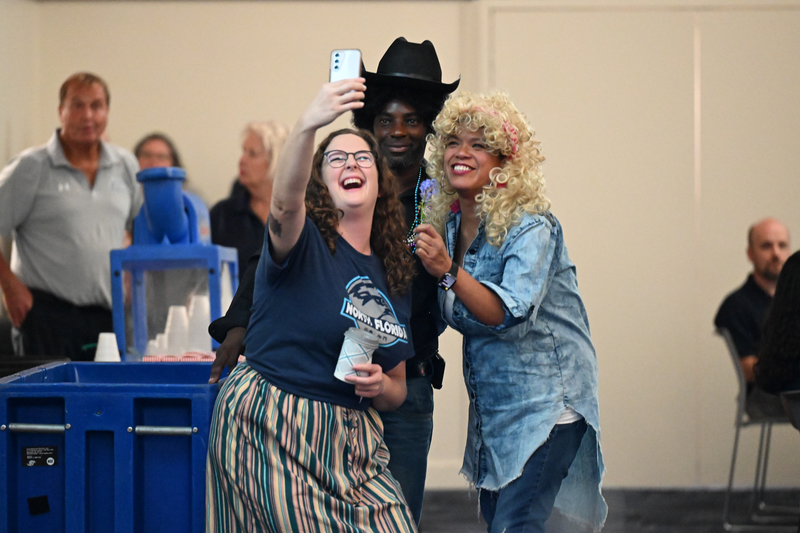 UNF employees taking a selfie