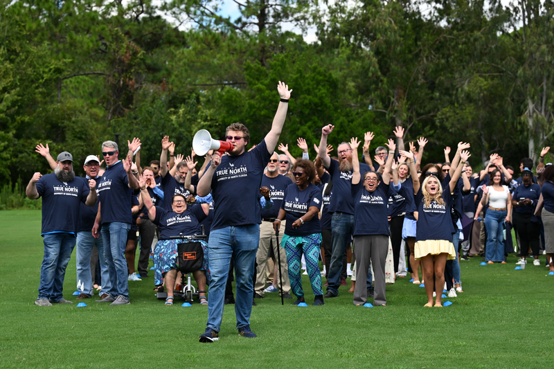 UNF employees cheering