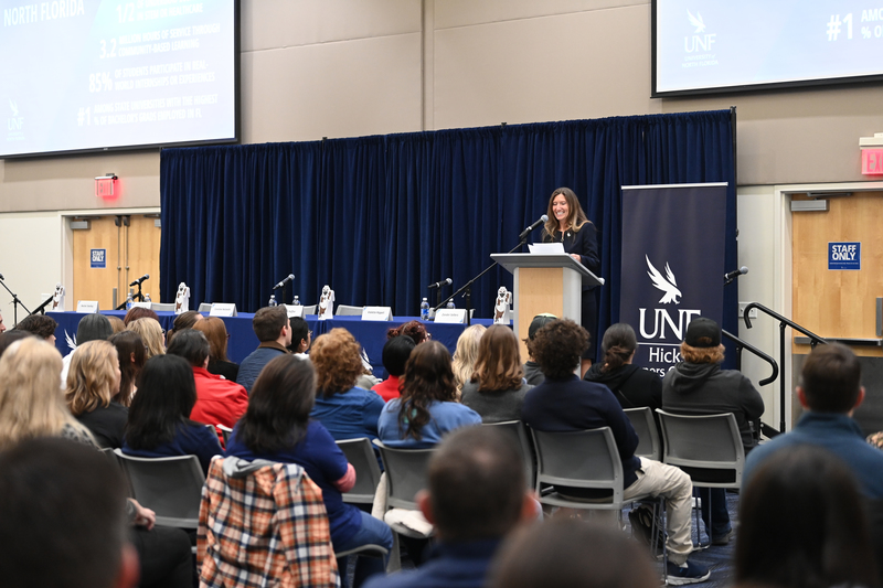 Speaker addressing audience at UNF Hicks Honors College Day