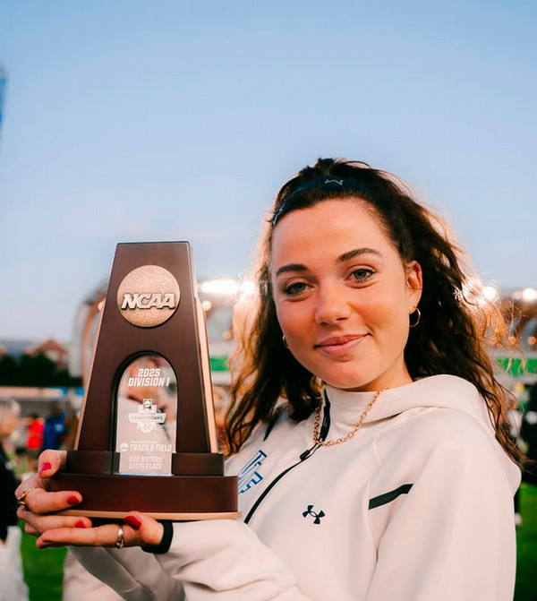 UNF track and field student-athlete Smilla Kolbe holding a trophy