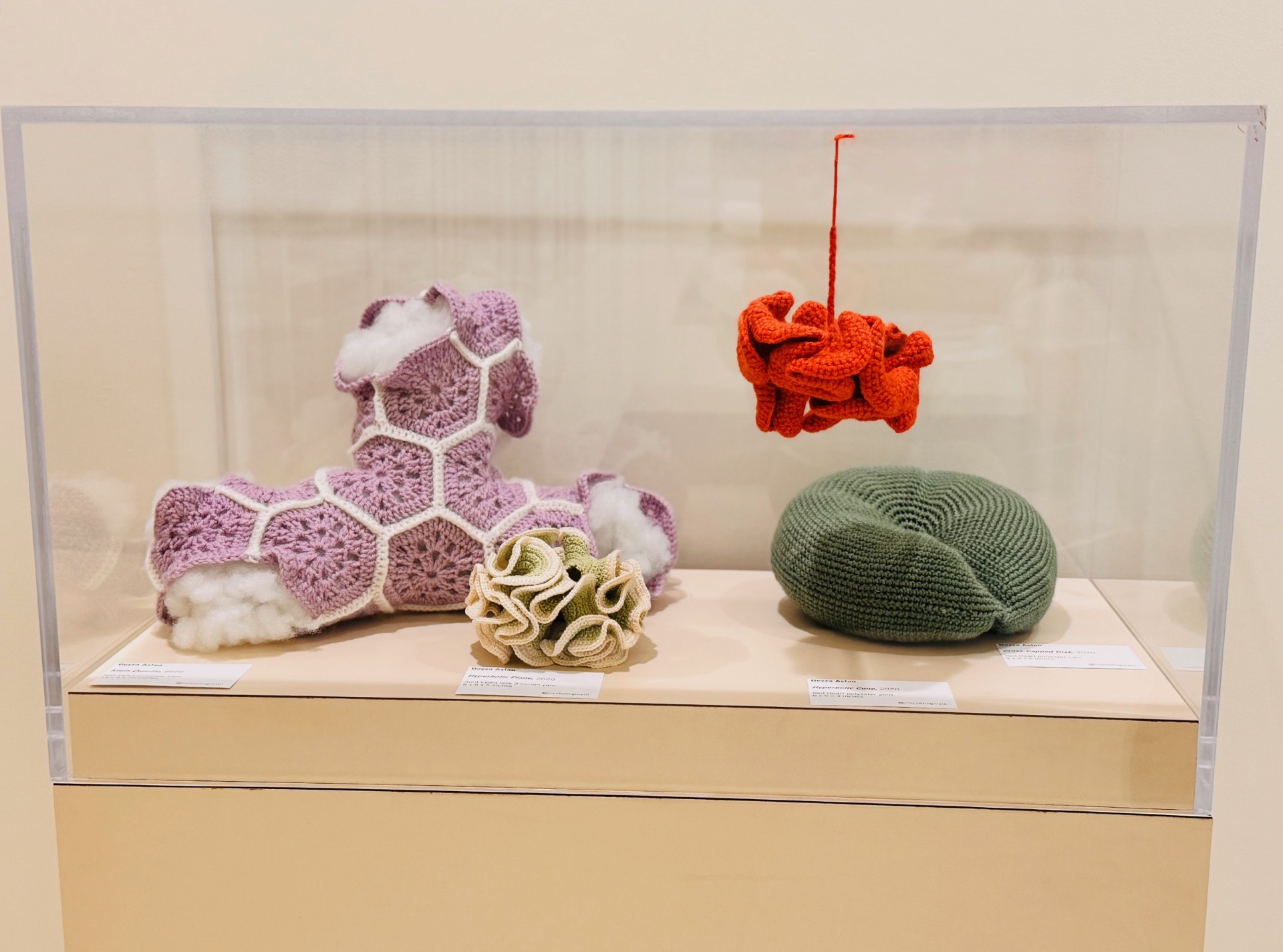 Crochet art figures on display