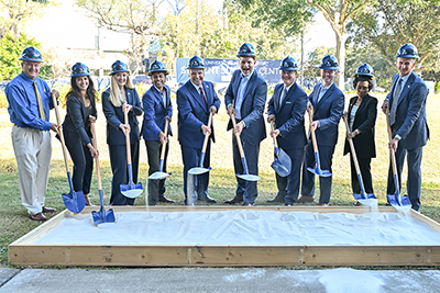 UNF President Moez Limayem and others at site of Student Success Center