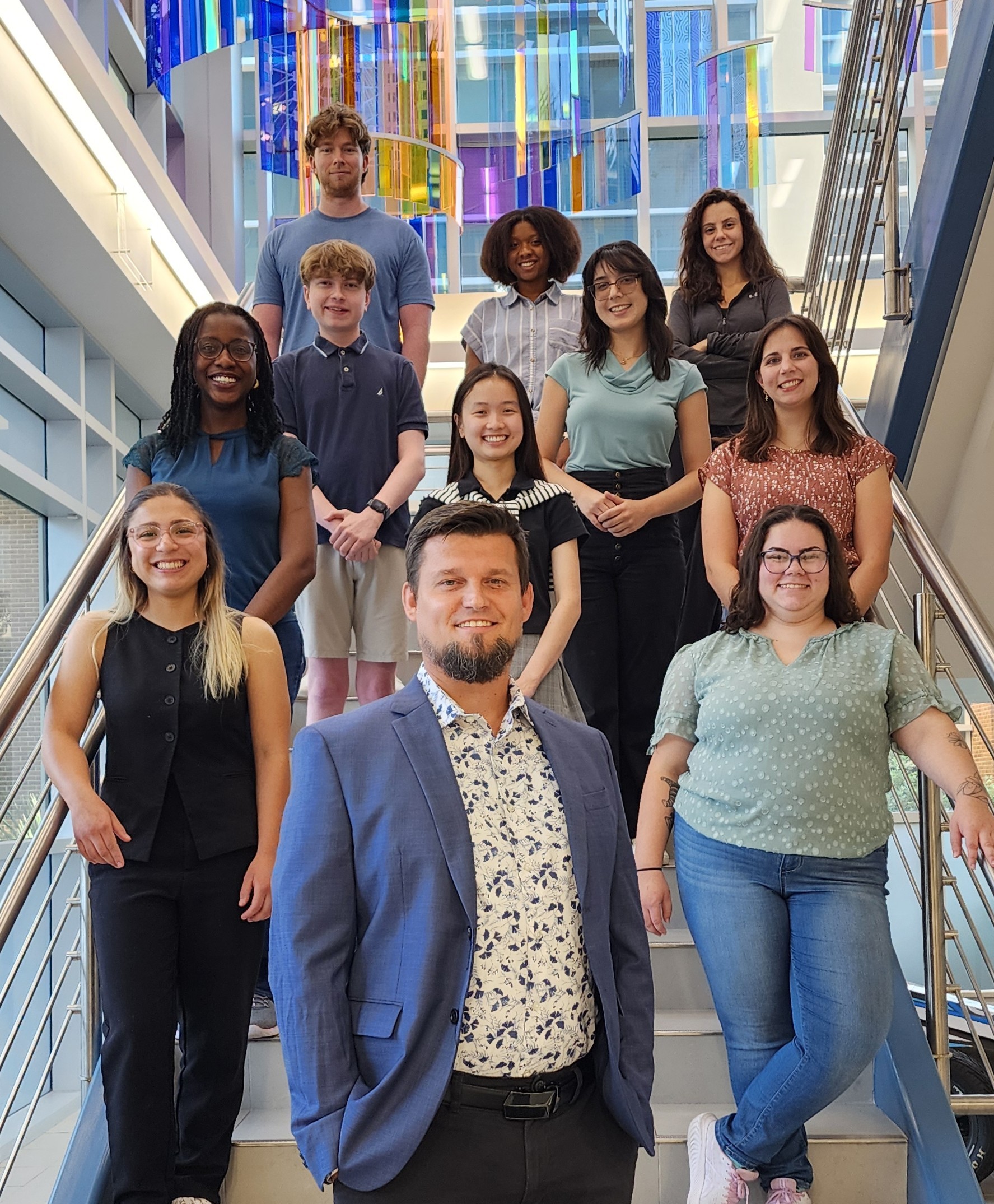Dr. Szymon Ciesielski and his student team posed on stairwell