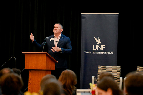 Dr. Matthew Ohlson speaking at a UNF Taylor Leadership Institute event