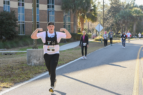 Runner cheering at the Swoop the Loop 2026 event