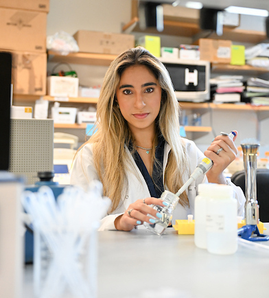 UNF student Anne Araujo working in a lab
