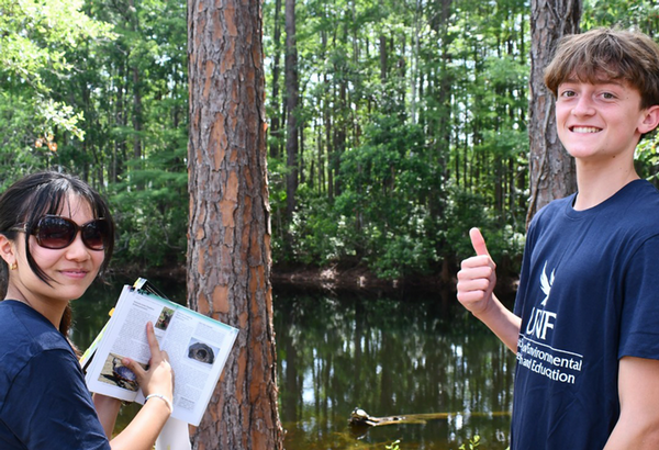 UNF IERE students researching a body of water