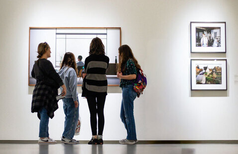 Patrons at MOCA Jacksonville looking at wall art