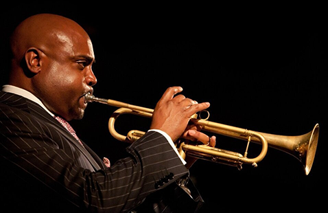 Jazz trumpeter on stage performing
