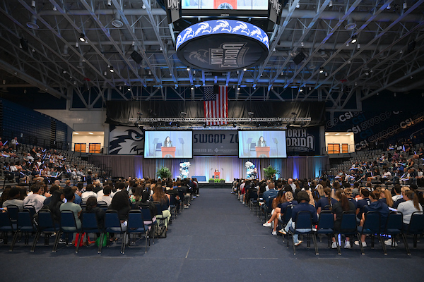 Seated audience at the UNF Convocation 2026 event facing the stage