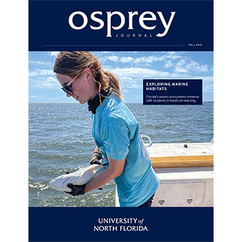 osprey journal fall 2021 cover with student on a boat