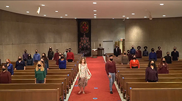 UNF School of Music students performing Messiah On The Move while socially distanced inside church pews