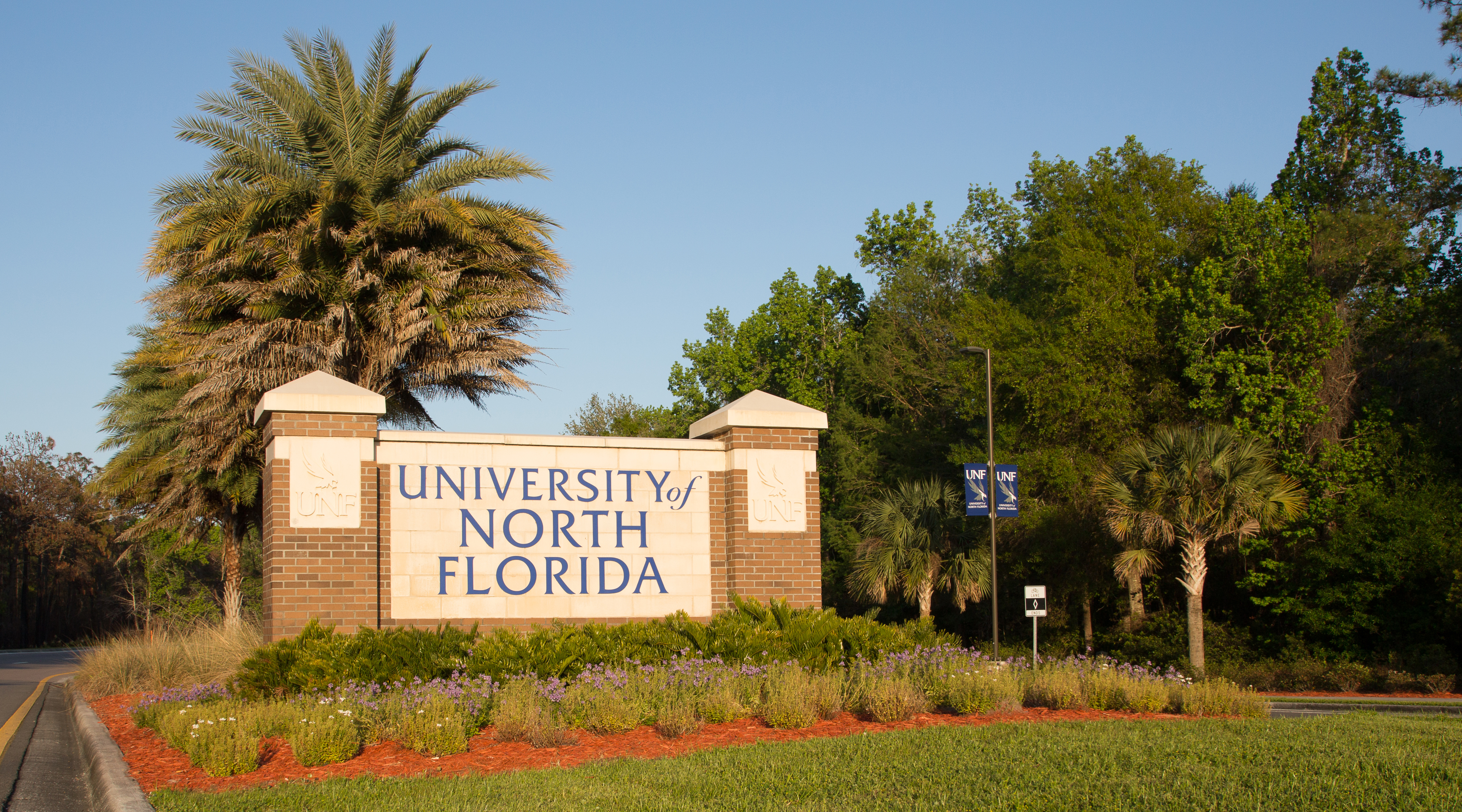 UNF entrance sign leading into campus
