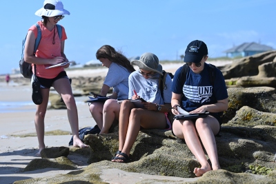 Environmental students working on the beach in West Florida