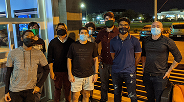 OspreySec student team members standing together wearing masks