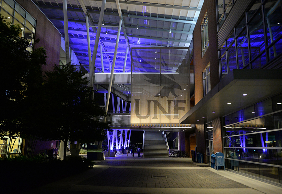 View of the Student Union with purple lights to symbolize Domestic Violence Awareness Month