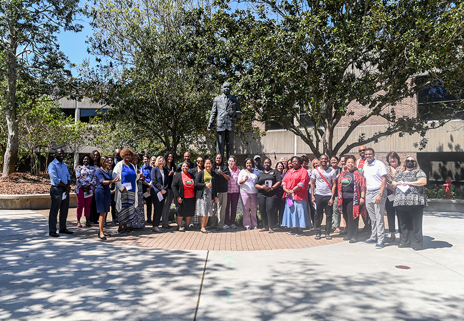 Group shot of AAFSA members in front of the MLK statue on campus