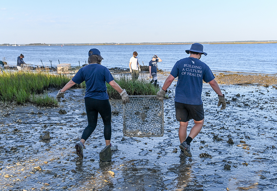 UNF coastal engineers and biologists placing oyster shell habitats near the Timucuan Preserve