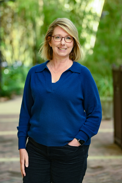 Christie Ellis, senior coordinator of employment in the UNF HR department smiling on campus