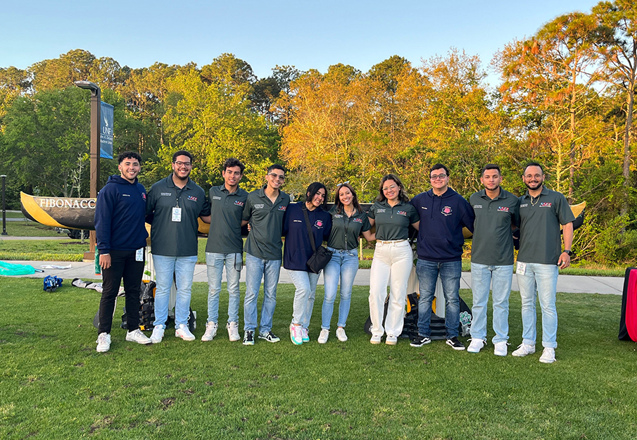 Puerto Rican team posing in front of their concrete canoe