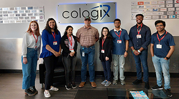The FL-DSSG interns standing in front of a Cologix sign