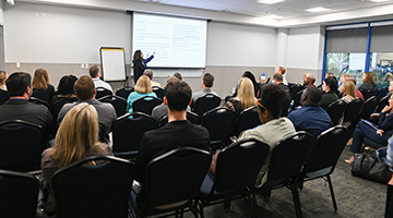 UNF company partners sitting in a room at the Employer Summit