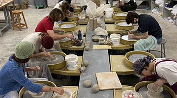Students from Heywood's ceramics class creating one-of-a-kind bowls