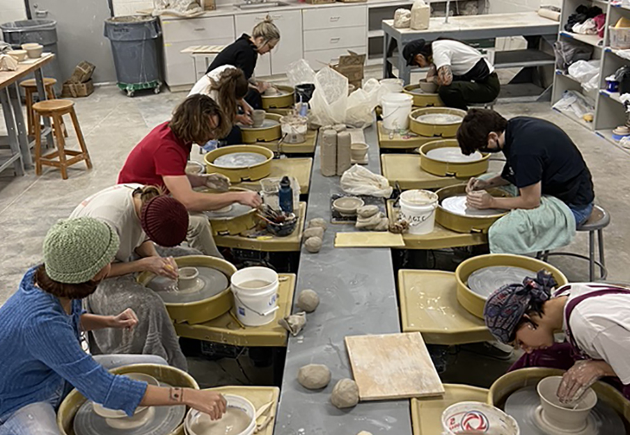Students from Heywood's ceramics class creating one-of-a-kind bowls