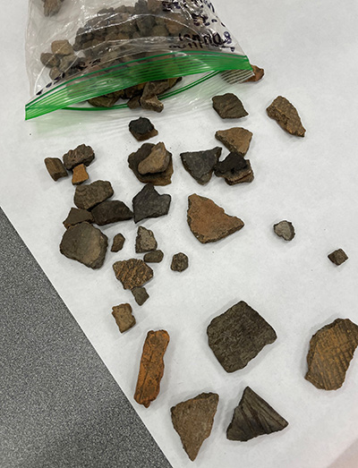 Pieces of an artifact found at an archaeological site