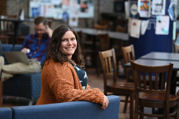 Krystina LeFils sitting in cafe