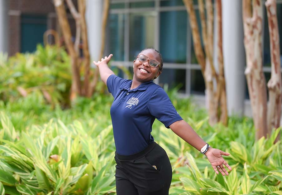 UNF graduate student Kiante (Kyaa) McClennon smiling