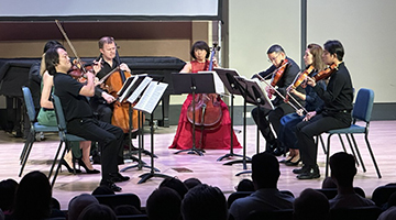Lawson Ensemble playing with violinist Scott Yoo in December Performance