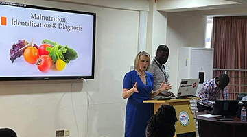 Dr. Wright giving lecture to students in Ghana