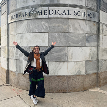 Maria Encinosa standing in front of Harvard Medical School