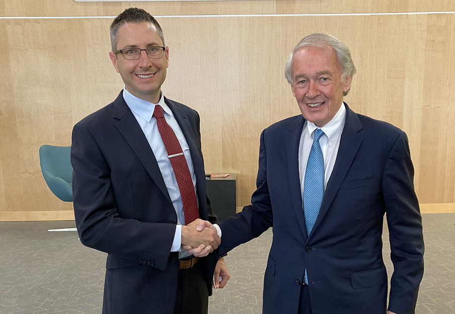 Josh Melko shaking hands with Senator Ed Markey