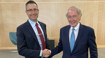 Josh Melko shaking hands with Senator Ed Markey