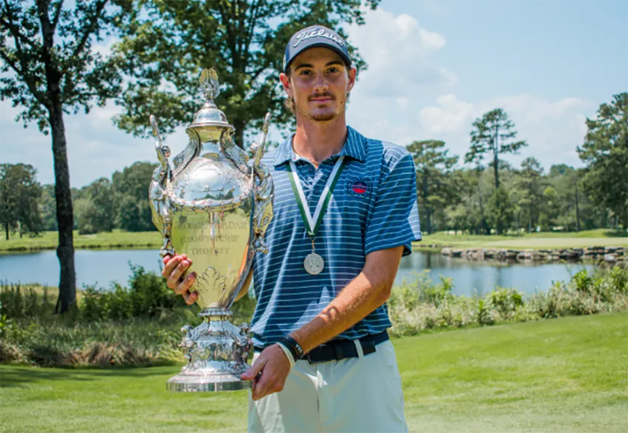 Nick Gabrelcik, student golfer, holding trophy, Photo Credit from PGA Tour